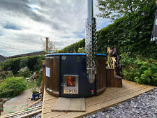 Wood fired hot tub with  grade