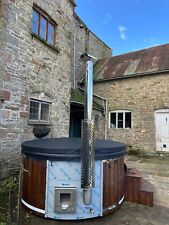 Integrated wood-fired hot